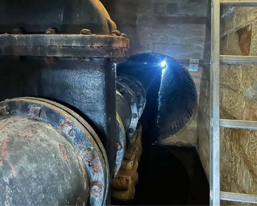 A view down a long dark tunnel underground, the conditions that the trained AGO Fire & Rescue operatives are training in working in